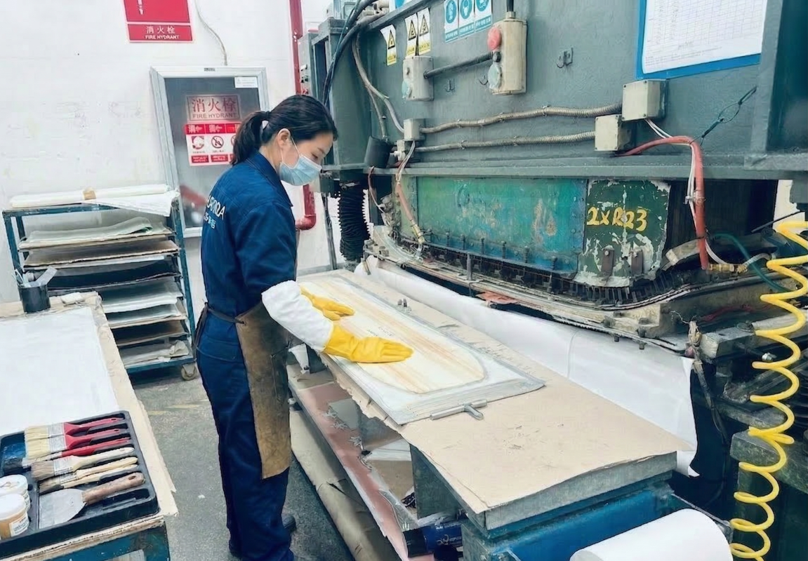 Precision milling of a custom snowboard wood core and carbon fiber stringers during the manufacturing process.